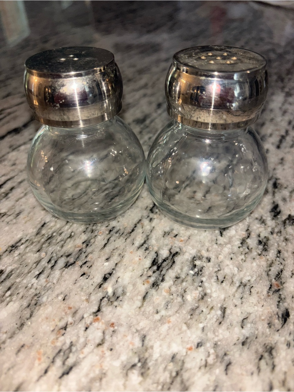 Olde Thompson Orbit glass salt and pepper shakers with metal tops